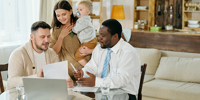 Young couple meeting with insurance agent